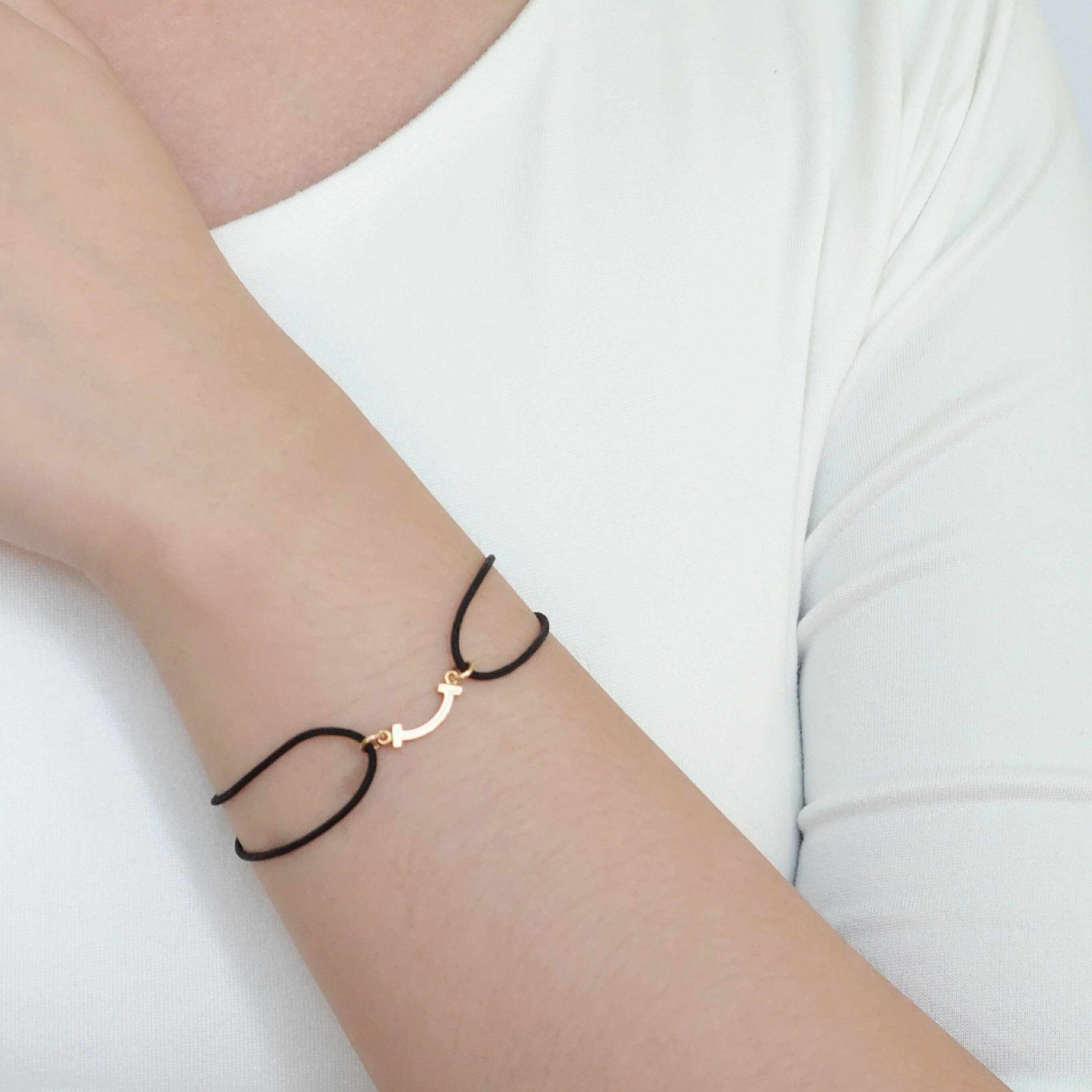 PRE-OWNED] Tiffany & Co. T Smile Cord Bracelet – grandeurtokyo